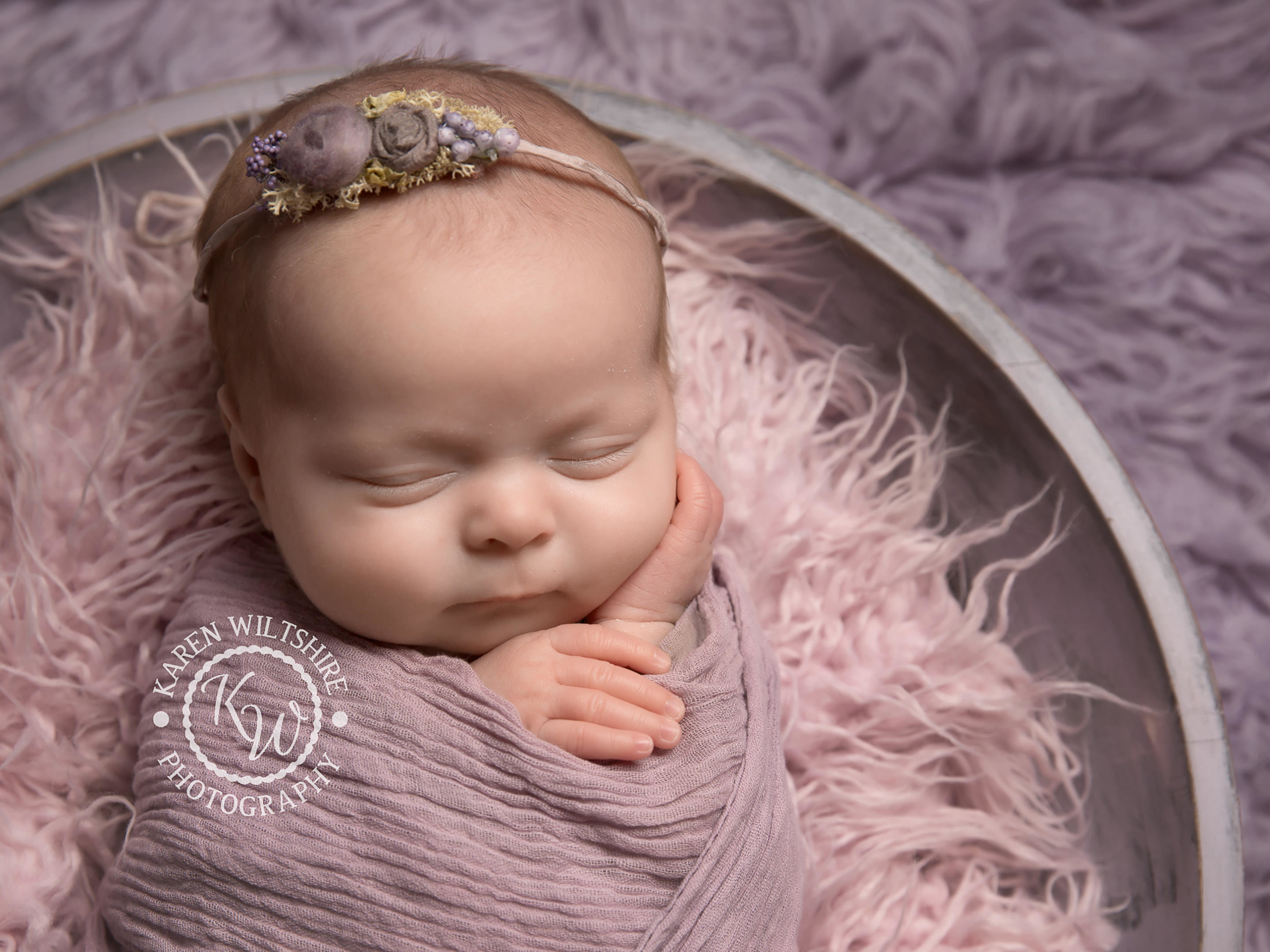 How old should a baby be at their newborn baby photoshoot?